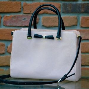 Pink and black Kate Spade purse.